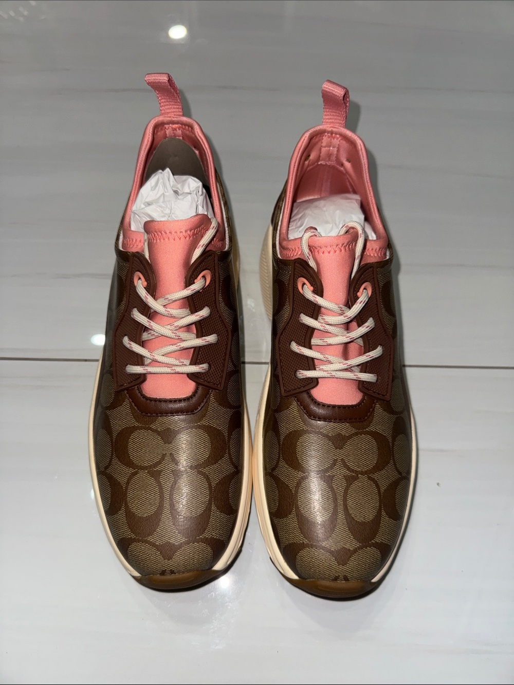 Coach Women's Brown Monogram Sneakers with Pink Accents